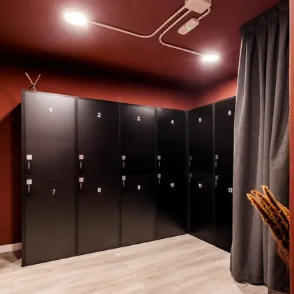 a locker room with a wood floor and a wood floor