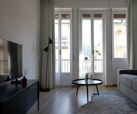 a living room with a couch and a coffee table