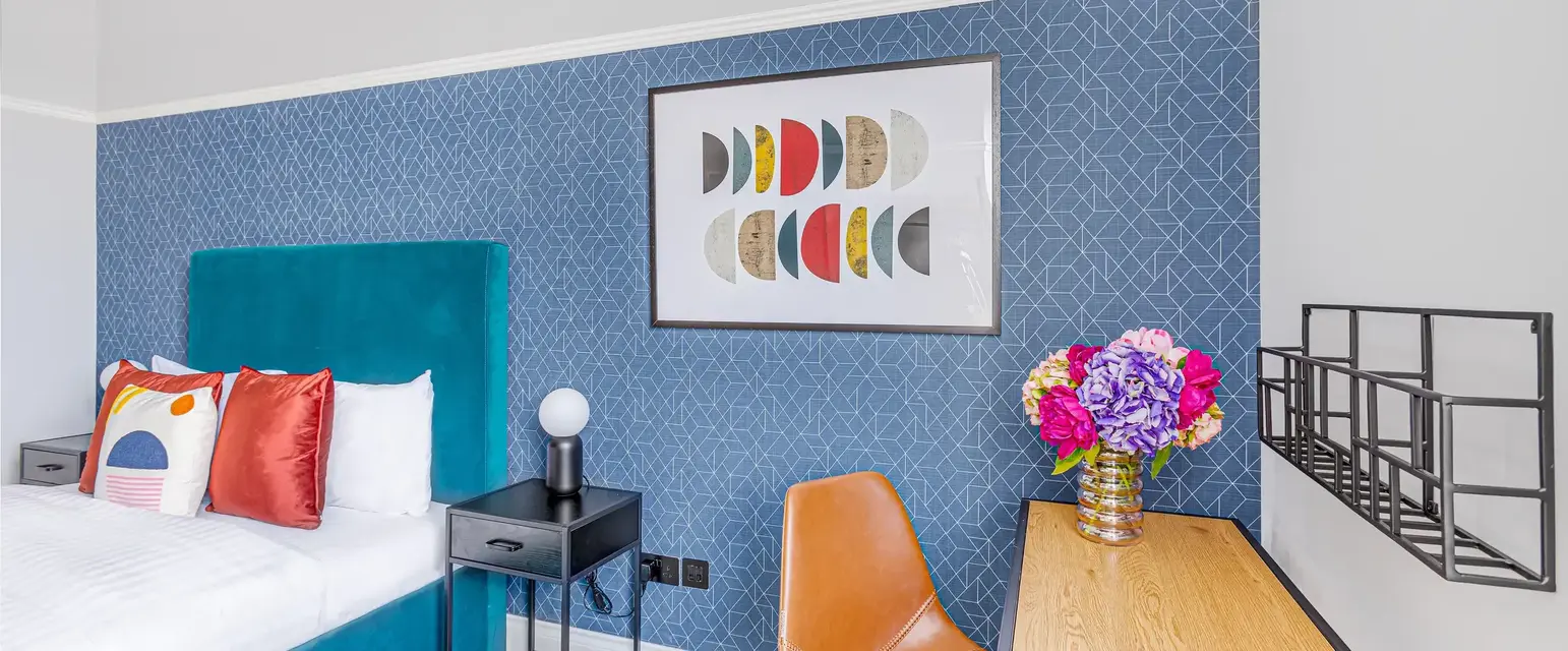 a room with a bed and a table