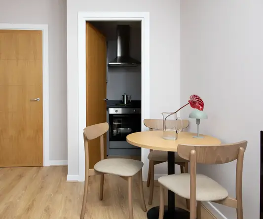 a table and chairs in a room