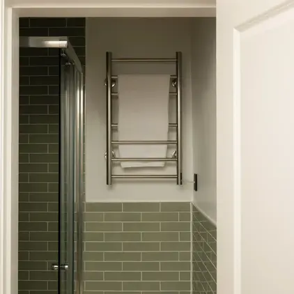 a bathroom with a towel rack