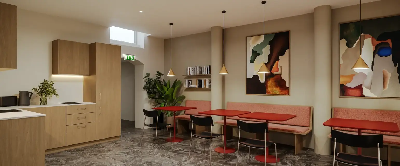 a room with a table and chairs