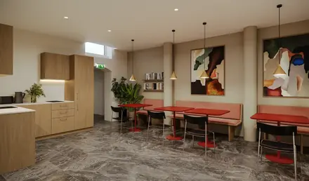 a room with a table and chairs