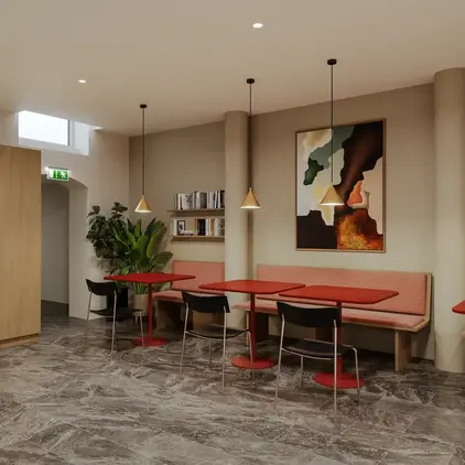 a room with a table and chairs