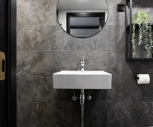 a sink and mirror in a bathroom