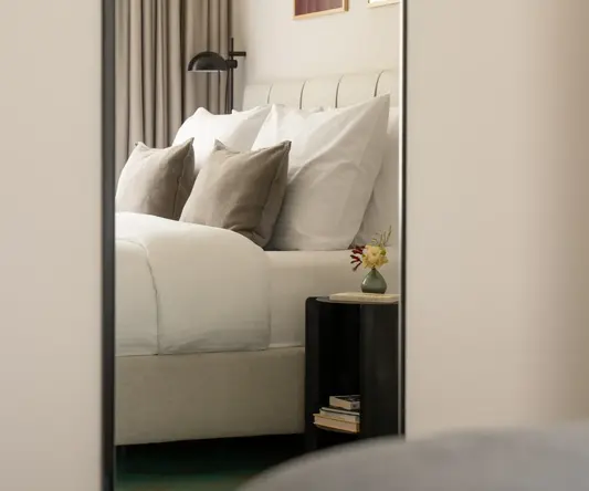 a mirror in a bedroom