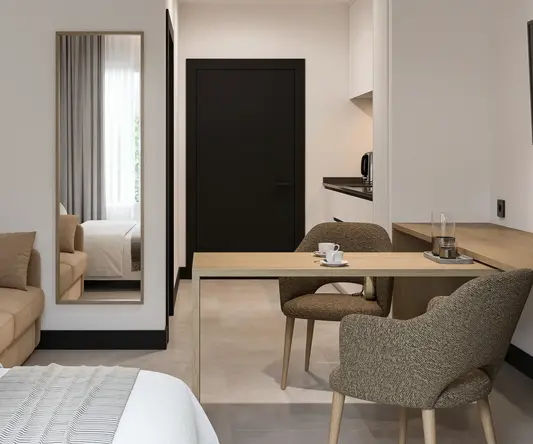 a room with a table and chairs