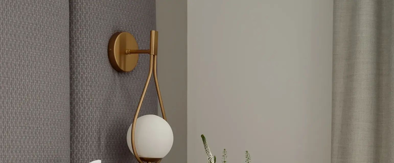 a bed with pillows and a cup of coffee on a table