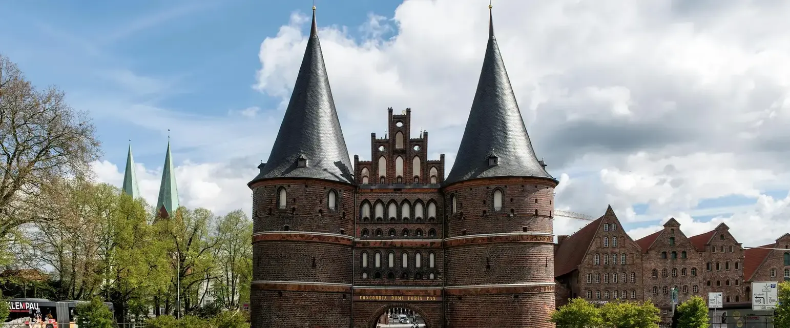 Step through Holstentor and you’re in Lübeck’s story — centuries of it, stacked in red brick.