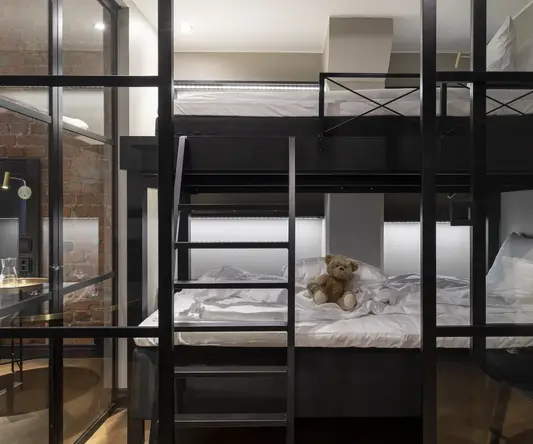 a teddy bear on a bed