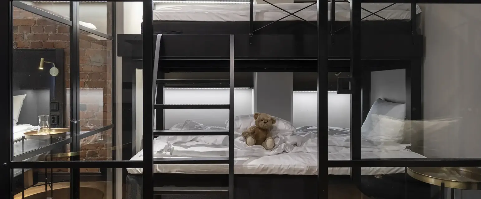 a teddy bear on a bed