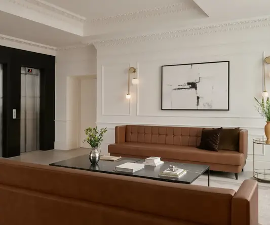 a room with a couch and elevator