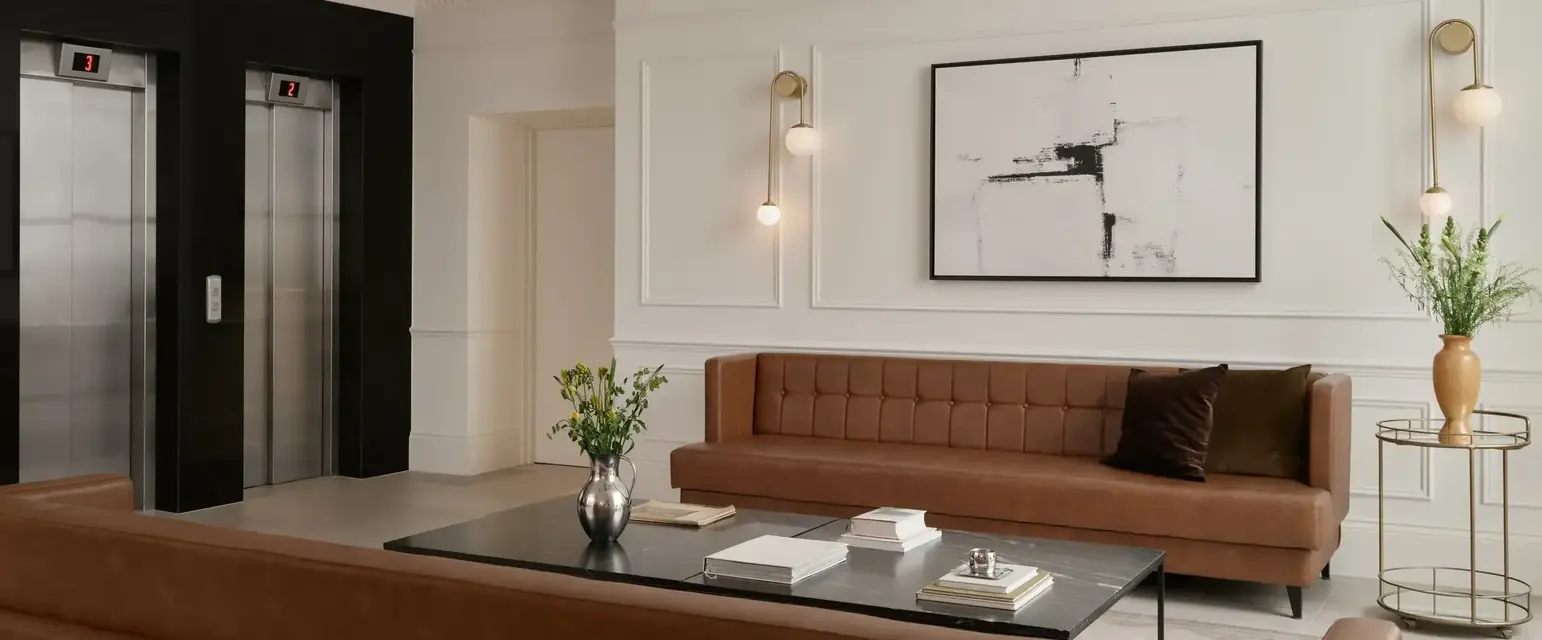 a room with a couch and elevator