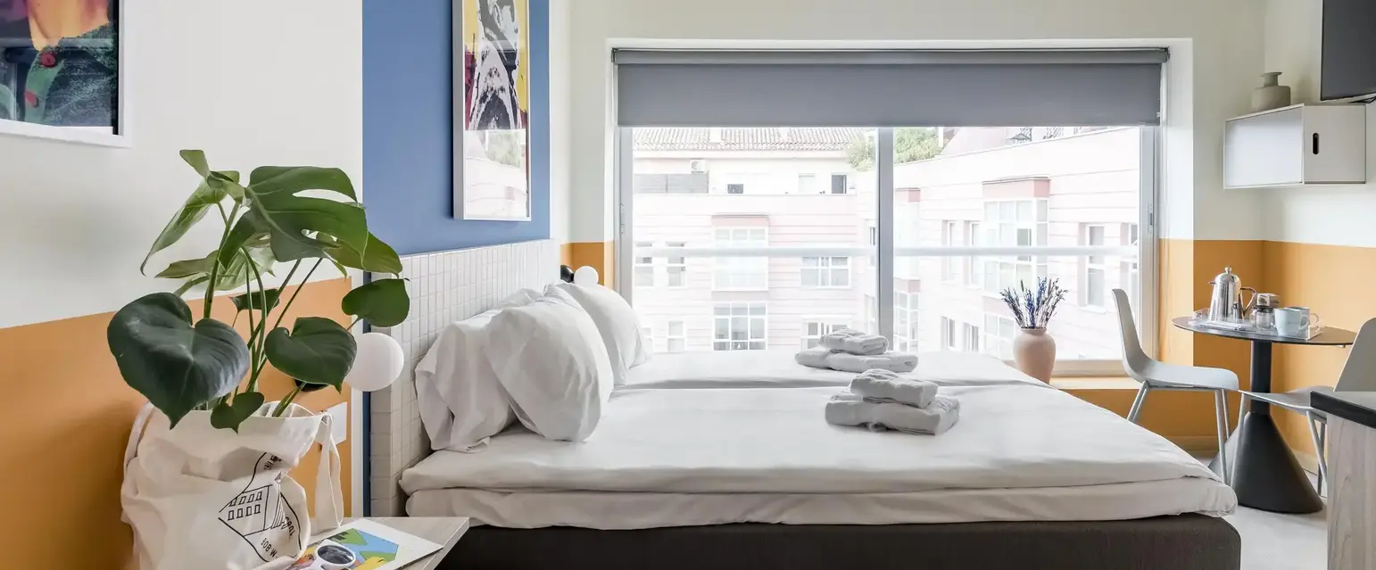 a bed with towels on it
