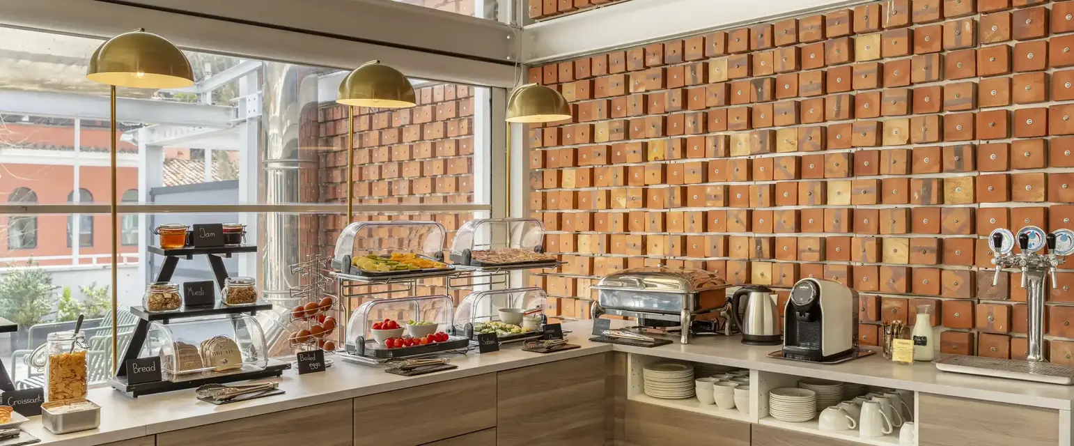 a kitchen with a counter and a coffee machine