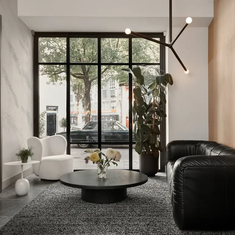 a room with a couch and a coffee table