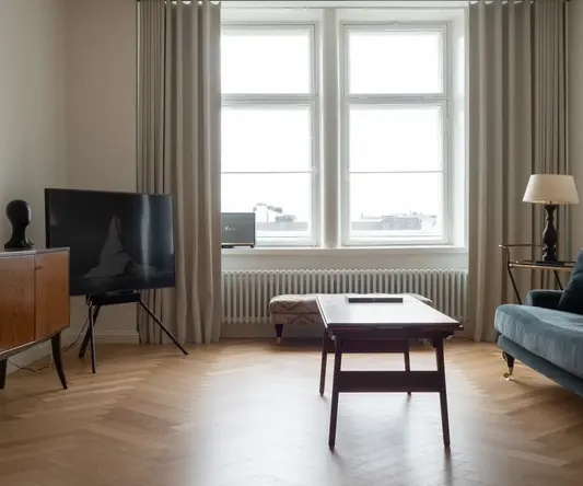 a living room with a couch and a tv