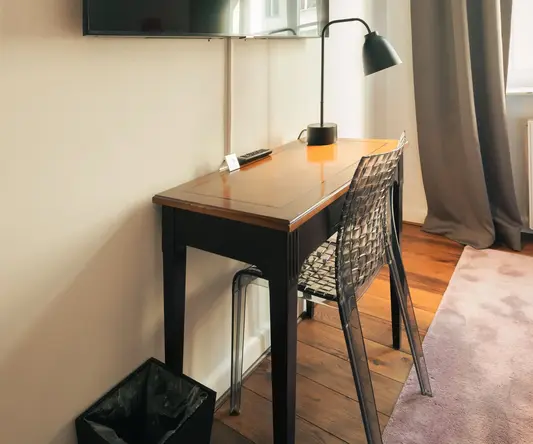 a desk and chair in a room