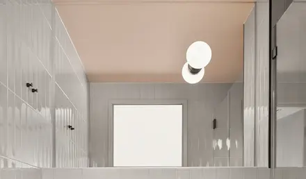 a bathroom with a green sink and toilet