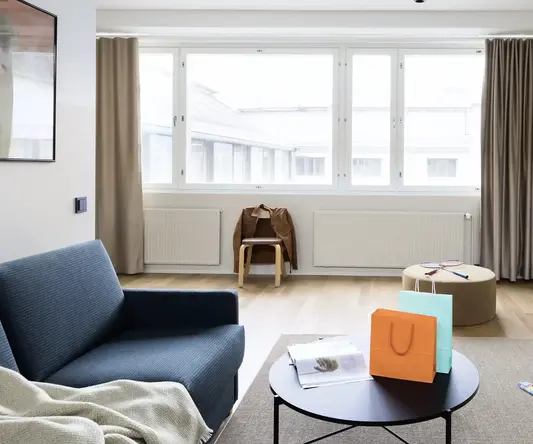 a living room with a couch and a coffee table