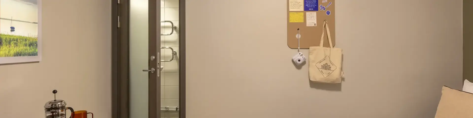 a bedroom with a door and a bed