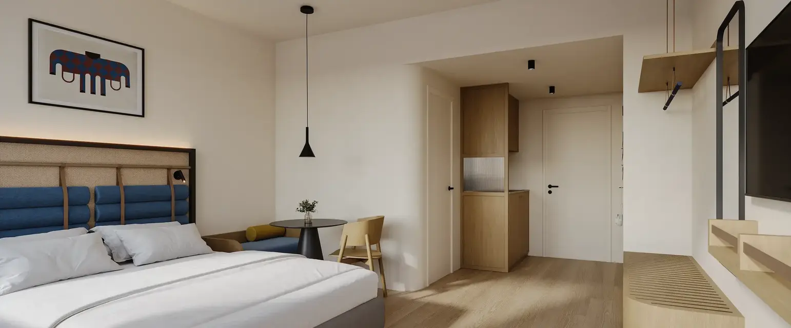 a bedroom with a bed and a table