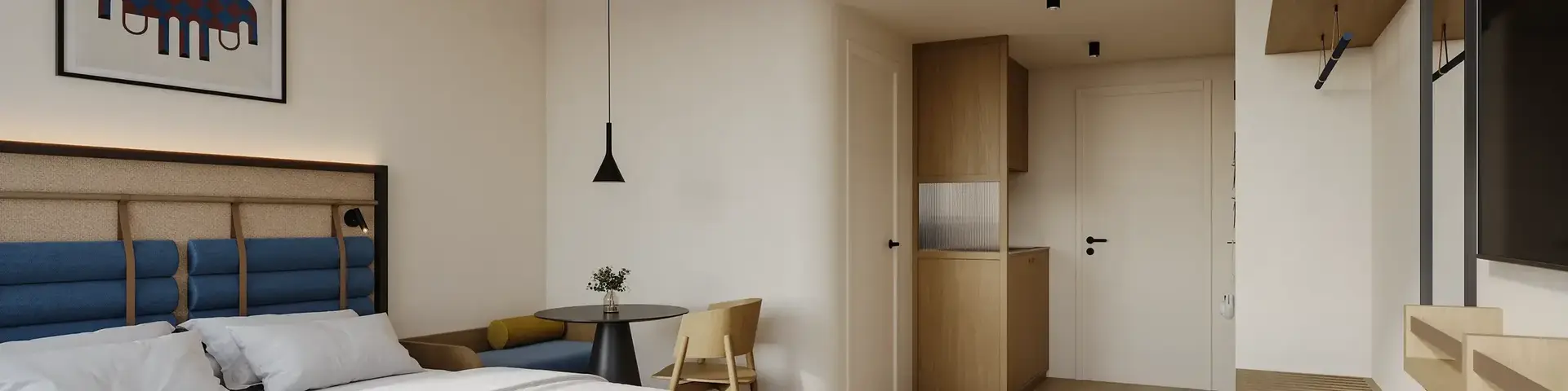 a bedroom with a bed and a table
