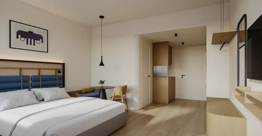 a bedroom with a bed and a table