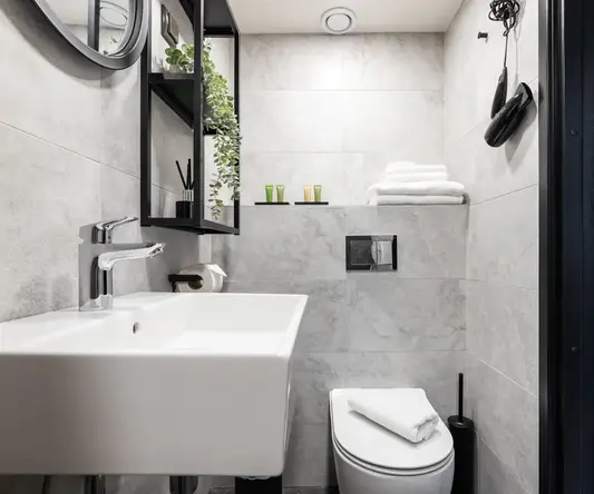 a bathroom with a sink and toilet