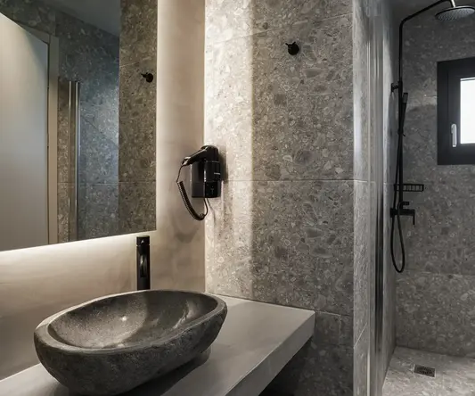a bathroom with a sink and shower