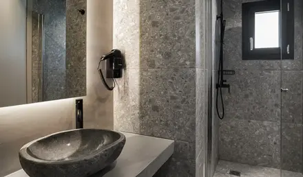 a bathroom with a sink and shower