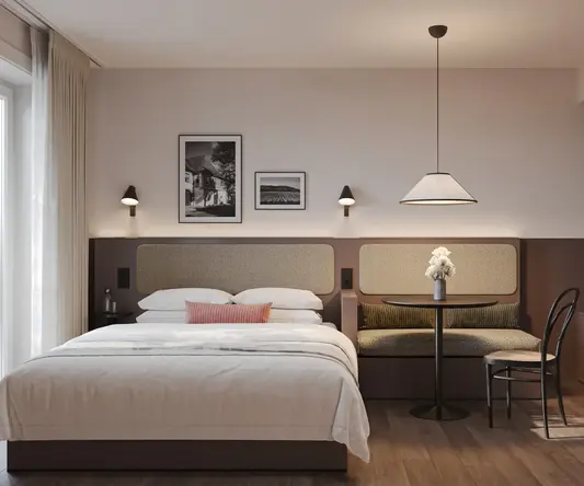 a room with a bed and a table