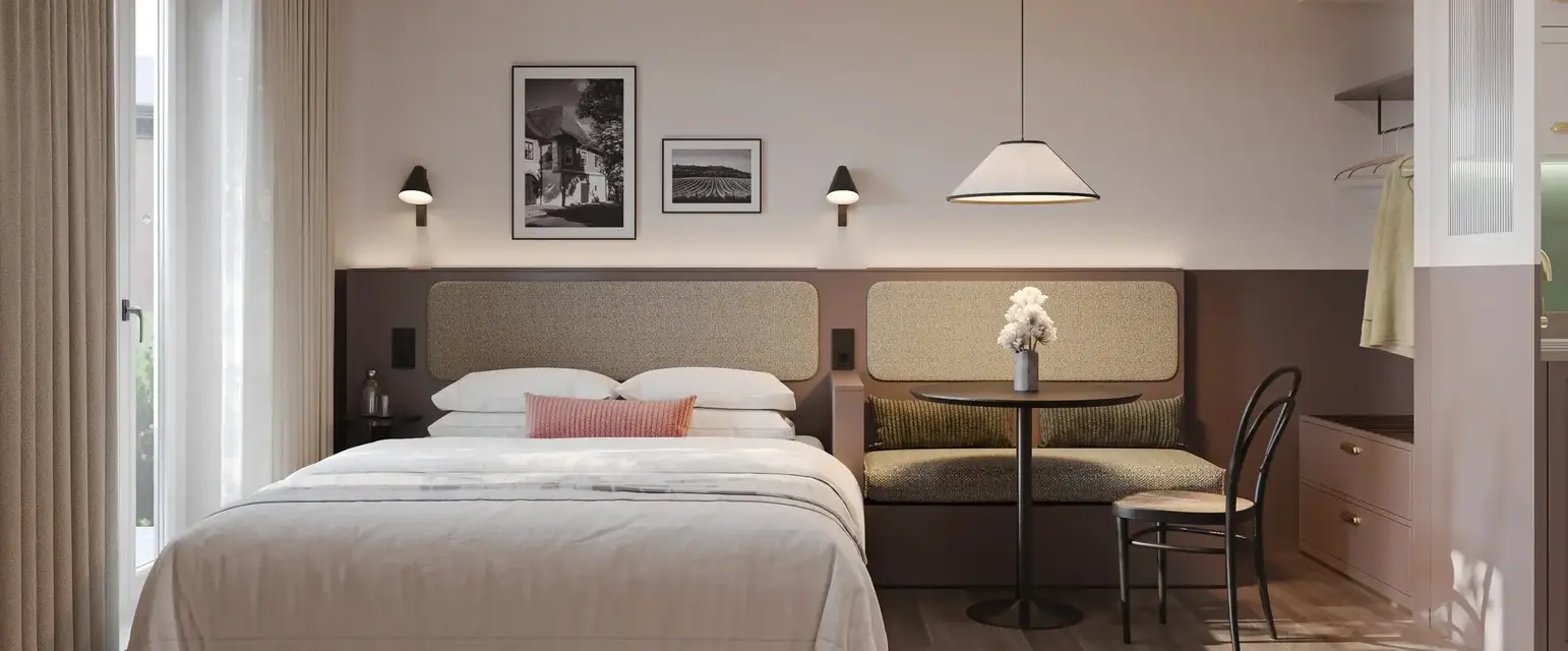 a room with a bed and a table