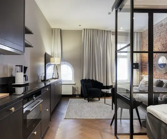 a room with a bed and a chair