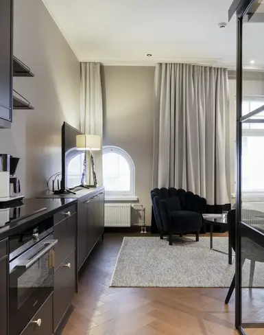 a room with a bed and a chair