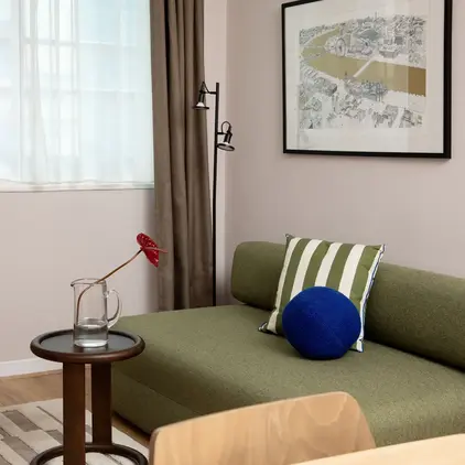 a living room with a couch and a table