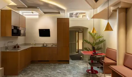 a room with a table and chairs