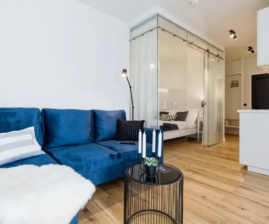 a blue couch in a room