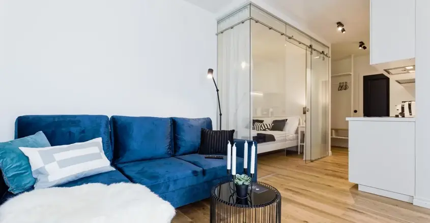 a blue couch in a room