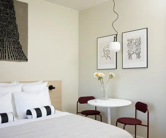 a room with a bed and a table