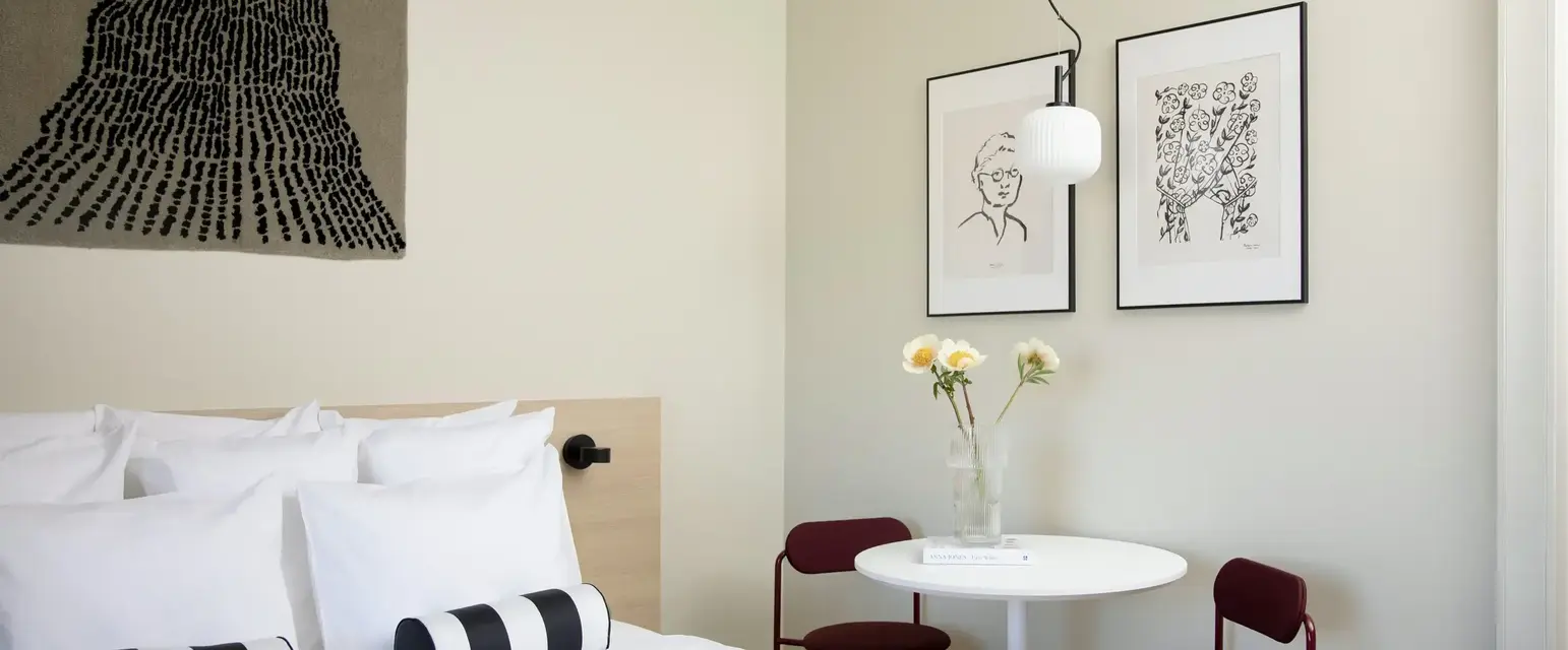 a room with a bed and a table