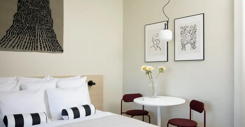 a room with a bed and a table