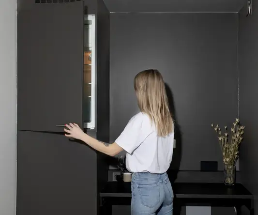 a woman standing in a room