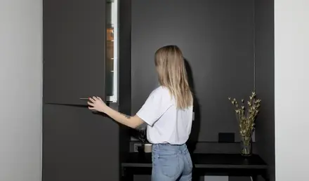 a woman standing in a room