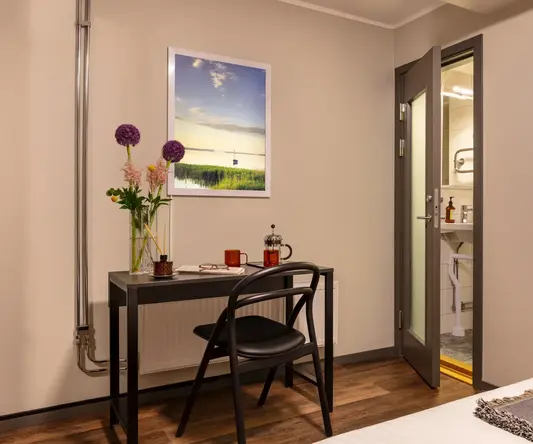 a desk and chair in a room