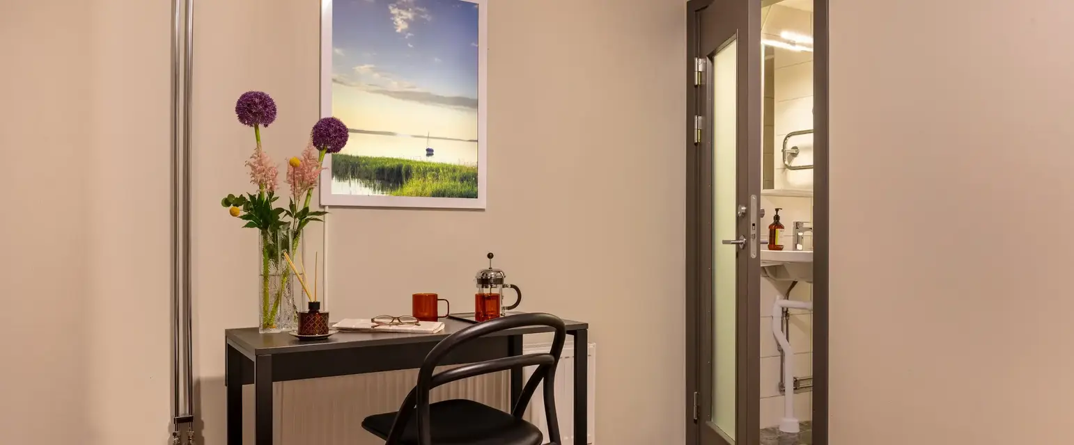 a desk and chair in a room