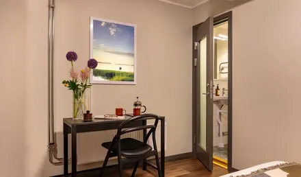 a desk and chair in a room