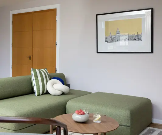 a living room with a couch and a coffee table
