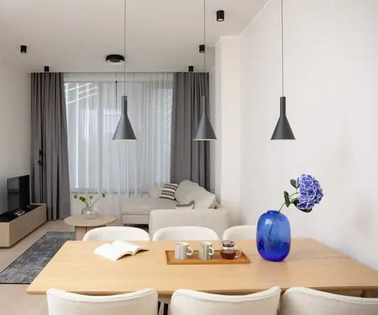 a room with a table and chairs