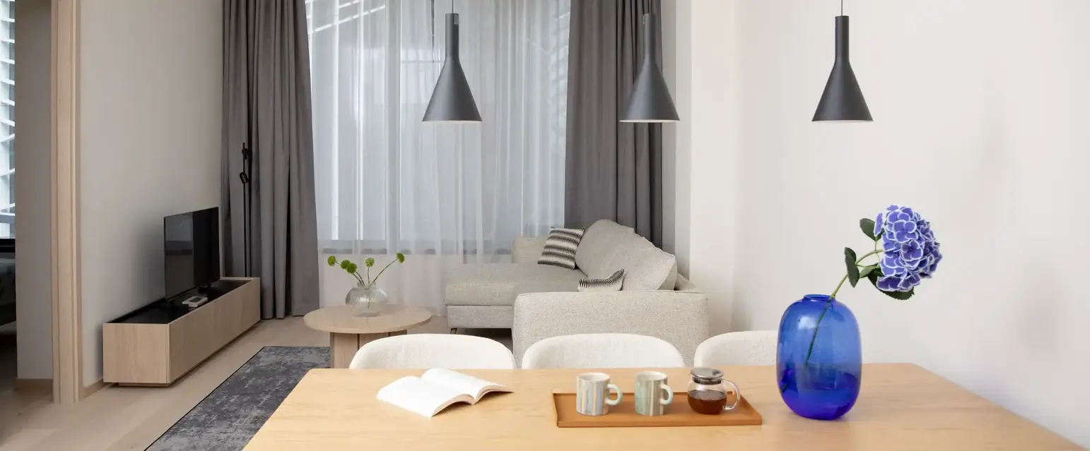 a room with a table and chairs